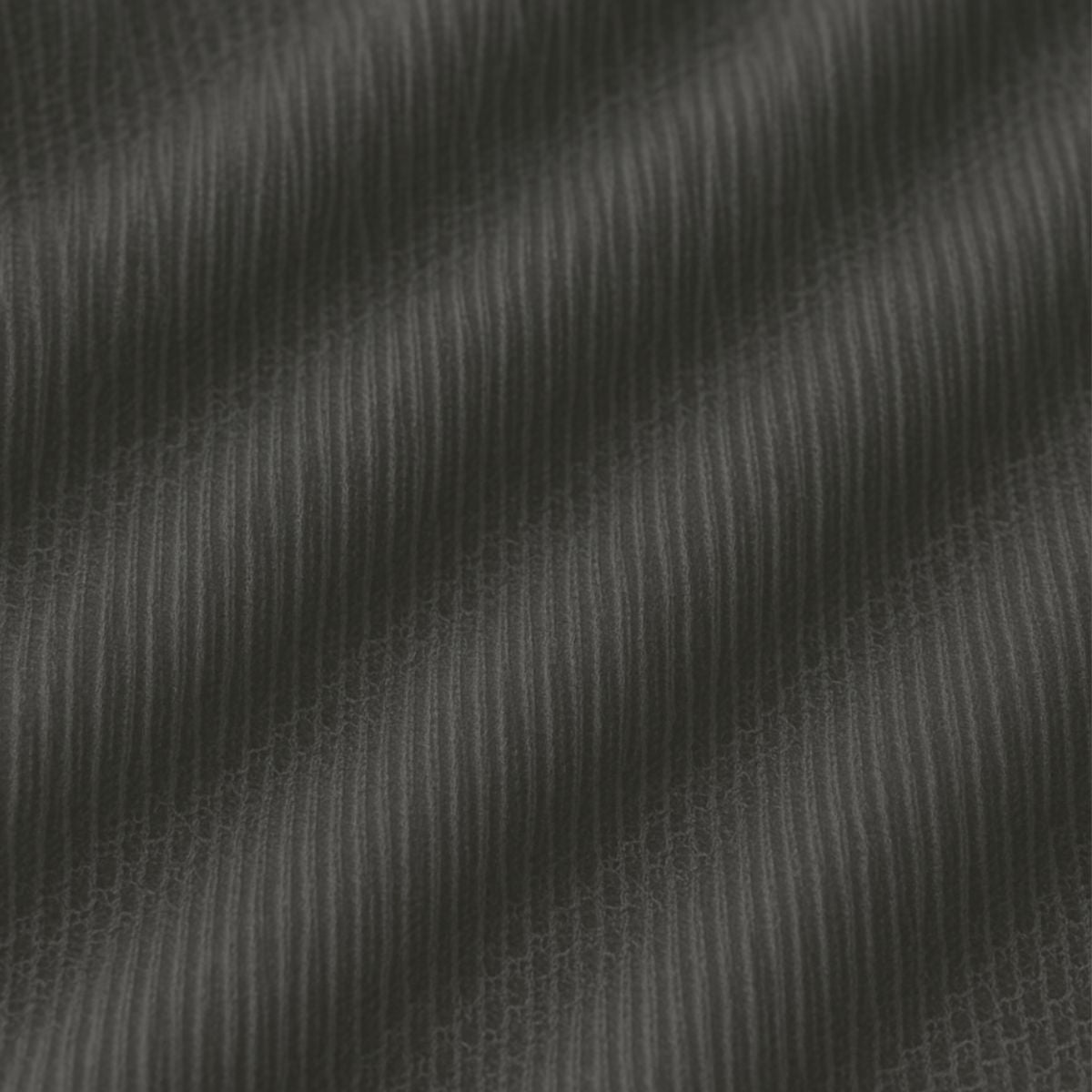 Makroaufnahme der Smart Layer erklärt, wie Periodenunterwäsche funktioniert. Die mittlere Schicht ist besonders saugstark und hält Flüssigkeit sicher im Inneren. Darstellung der weichen, dichten Fasern, die Feuchtigkeit aufnehmen und Auslaufen verhindern.
